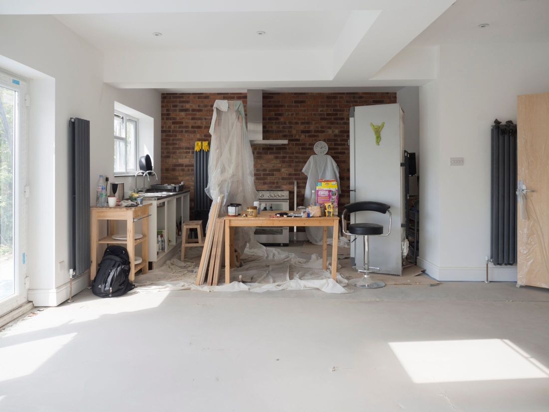 A kitchen and dining room, mid-renovation